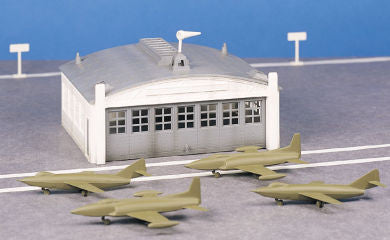 Airport Hangar with Airplanes